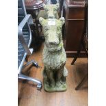 A PAIR OF COMPOSITION STONE FIGURES each modelled as a dog shown seated on hind legs on rectangular