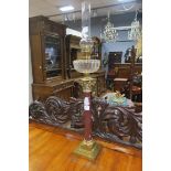 A VERY FINE 19TH CENTURY BRASS WINE AND RED VEINED MARBLE OIL LAMP with Corinthian capital and