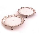 A pair of George III silver waiters,