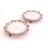 A pair of George III silver waiters,