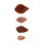 4000-2500bc. A collection of four Neolithic flint arrowheads from the collection of Rev. G. R.