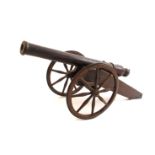 Victorian wooden cannon. A wooden model of a 19th century field artillery piece.