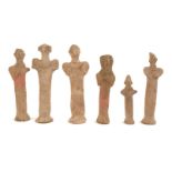 1180-700 bc. A collection of six Syro-Hittite ceramic votive figures.