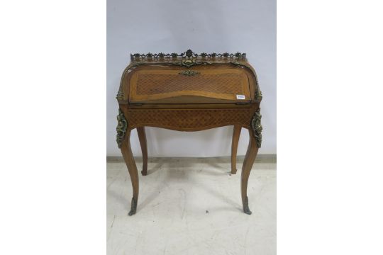 A CONTINENTAL KINGWOOD PARQUETRY AND GILT BRASS MOUNTED LADY'S DESK,