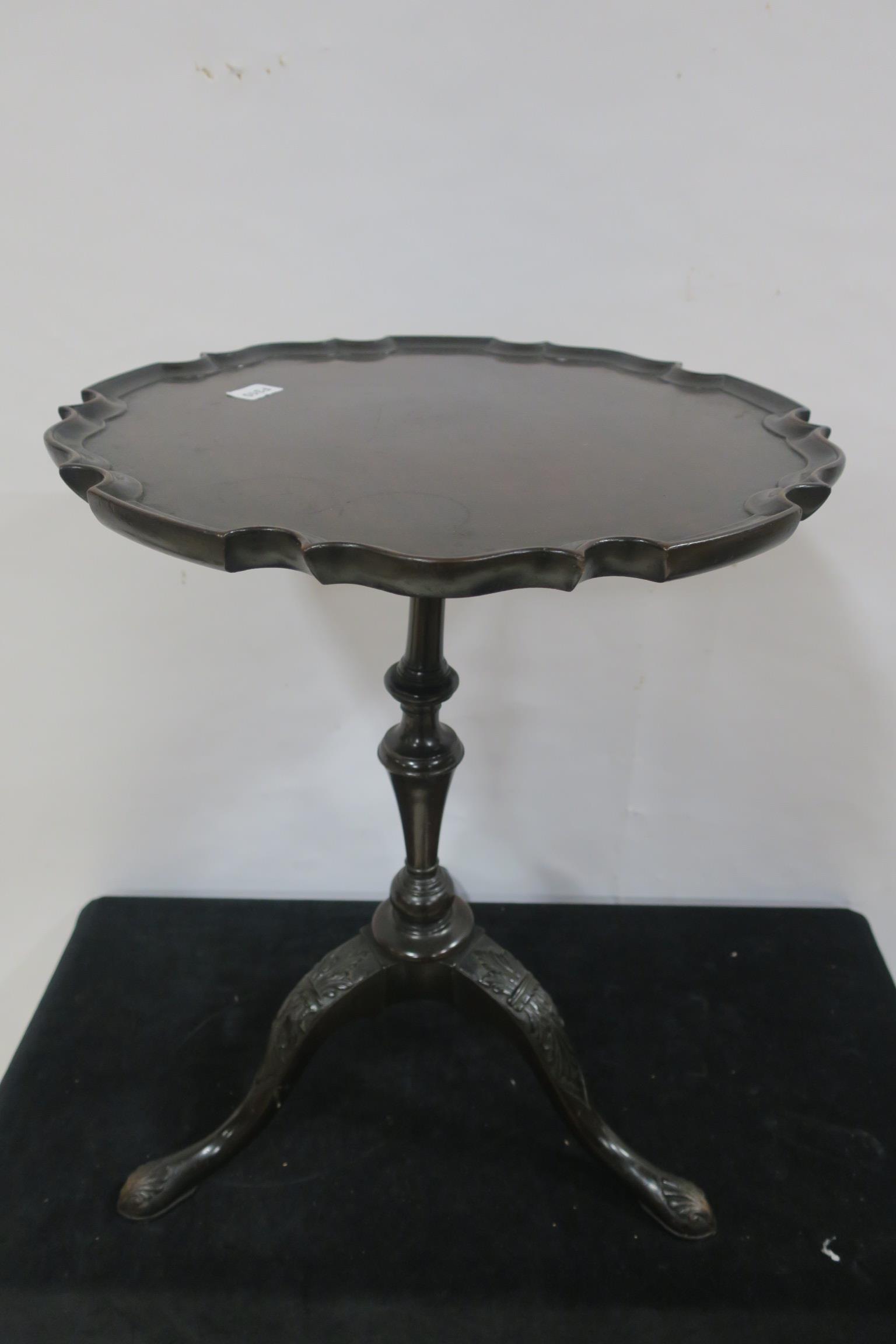 A 19TH CENTURY MAHOGANY WINE TABLE the circular top with piecrust rim above a baluster column on