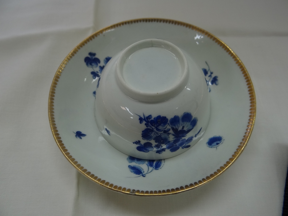 Worcester c 1765 Dr Wall period. Flower sprigs pattern tea bowl and saucer painted in Dry Blue