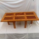 Small low coffee table made in solid ash with a veneered top in ash, burr elm and black and orange