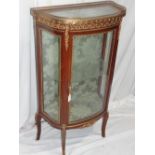 French gilt metal mounted D shaped display cabinet with galleried top, silk lined interior and