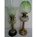 Two good brass and fancy glass oil lamps with shades