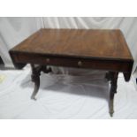 Regency mahogany sofa table with ebony stringing, three drawers, three false, turned column