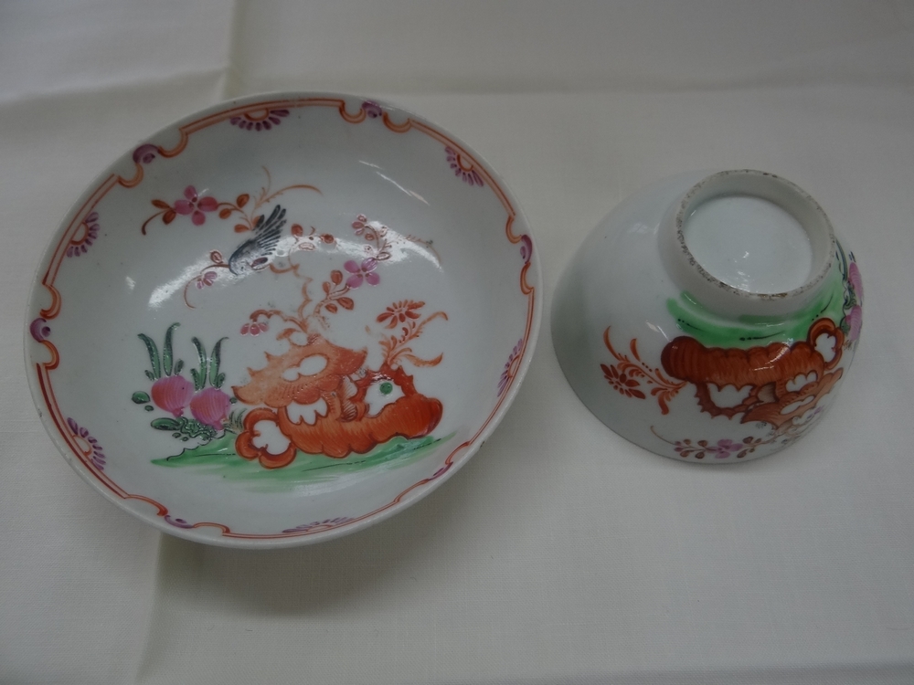 Lowestoft c 1770. Blackbird in a flowering tree pattern tea bowl and saucer in polychrome. Hand