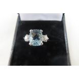 Fancy cut aquamarine and diamond ring set in platinum