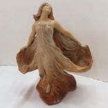 Austrian Art Nouveau terracotta figure of scantily clad woman in a flowing dress. Ht. 14 ins.,