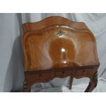 Pretty French bombe shaped kingswood and rosewood ormolu mounted lady's bureau with stepped