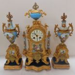 Late 19thC French gilt spelter three piece clock garniture with decoration of porcelain plaques,