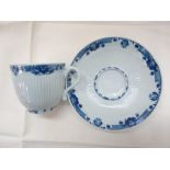 Worcester c 1756-1758. Trembleuse pattern ribbed coffee cup and saucer with underglaze blue and