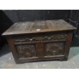 Small 18thC carved oak coffer with panel top and sides, on block feet. 32.5 x 19 ins.