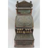 National cast brass cash register circa 1910 for the British market, no. 636800, 21 x 16 x 10 ins.