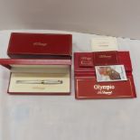 S.J. DuPont, Paris. 48010M Olympio 18K gold nib pen with engine turned silver metal case, papers,