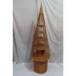 "Rocket" display cabinet. A fine twelve-sided conical display cabinet with glazing bars of English