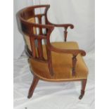 Edwardian inlaid rosewood curved open arm chair with upholstered back and seat on sqaure tapering