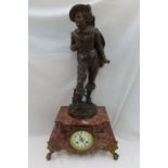 Late Victorian spelter figure clock with red figured marble base and ormolu mounts. Ht. 24 ins.