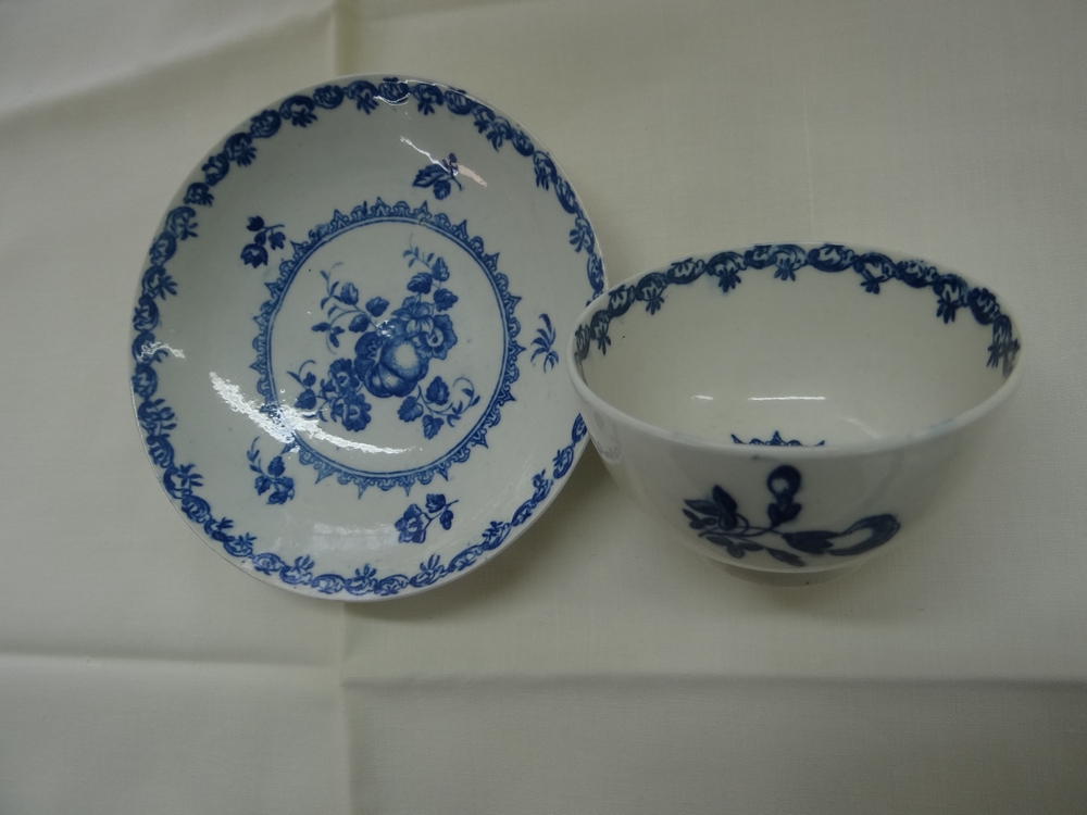 Caughley c 1780. Fruit pattern tea bowl and saucer in underglaze blue with various fruits. S+ - Image 2 of 3