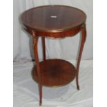 French style kingwood veneered circular gilt metal mounted occasional table on slender, tapering