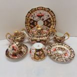 Royal Crown Derby tea set comprising tea pot, sugar bowls (one with lid), two cake plates, twelve