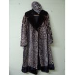 Lady’s ocelot 3/4 length coat with mink collar and revers together with matching hat, size 12 - 14