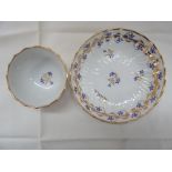 Derby c 1790. Pattern No. 111 tea bowl and saucer with gilding and gold, blue, pink and green