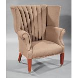Georgian-Style Mahogany Wing Chair , 20th c., labeled Ralph Lauren, channeled back, scrolled arms,