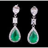 Pair 18 kt. White Gold, Emerald and Diamond Dangle Earrings , set with 2 pear shaped emeralds, total