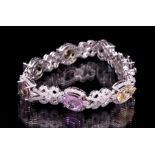 Rare 14 kt. White Gold, Sapphire and Diamond Bracelet , seven prong set oval mixed cut multicolor