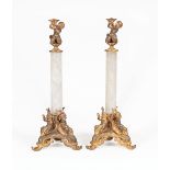Pair of French Rock Crystal and Bronze Figural Candlesticks , c. 1900, surmounted by a Merbaby,