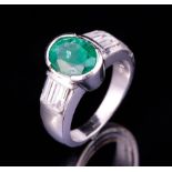 14 kt. White Gold, Emerald and Diamond Ring , half bezel set oval faceted emerald, shoulders with