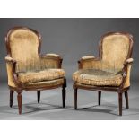 Two Antique Louis XVI-Style Carved Mahogany Bergeres , each with molded crest rail, scrolled arms,
