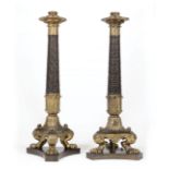 Pair of Large Charles X-Style Bronze Lamps , 20th c., tripartite base, lion feet, socket fixture, h.