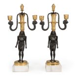 Pair of Egyptian Revival Gilt and Patinated Bronze Two-Light Candelabra , 19th c., candlearms with