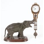 Continental Patinated Metal Figural Swinging Clock , c. 1900, probably Junghans, Germany, "
