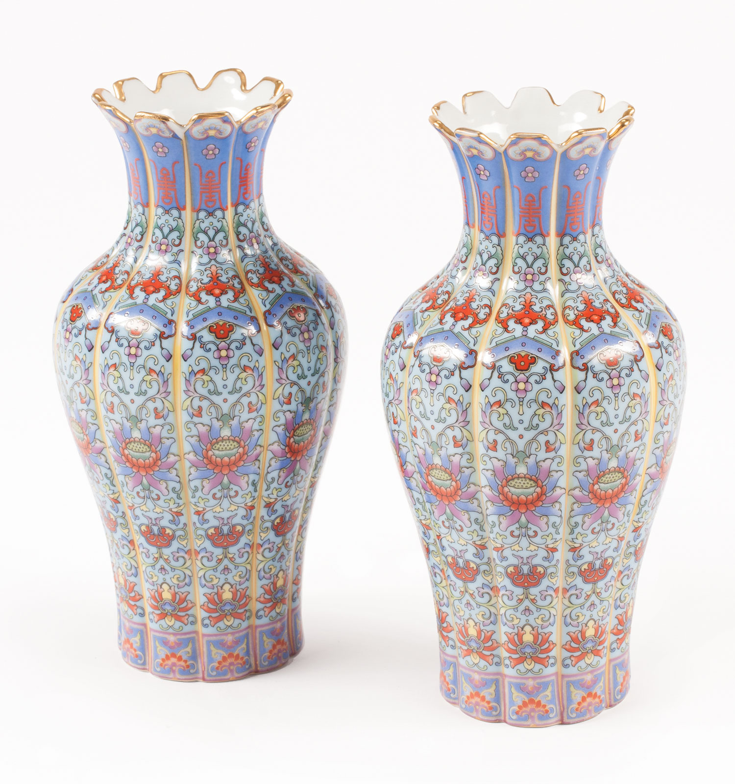 Decorative Pair of Chinese Polychrome Porcelain Fluted Vases , decorated with stylized bats and