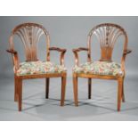 Pair of Adam-Style Carved Mahogany Armchairs , 20th c., bellflower-carved fan back, scrolled