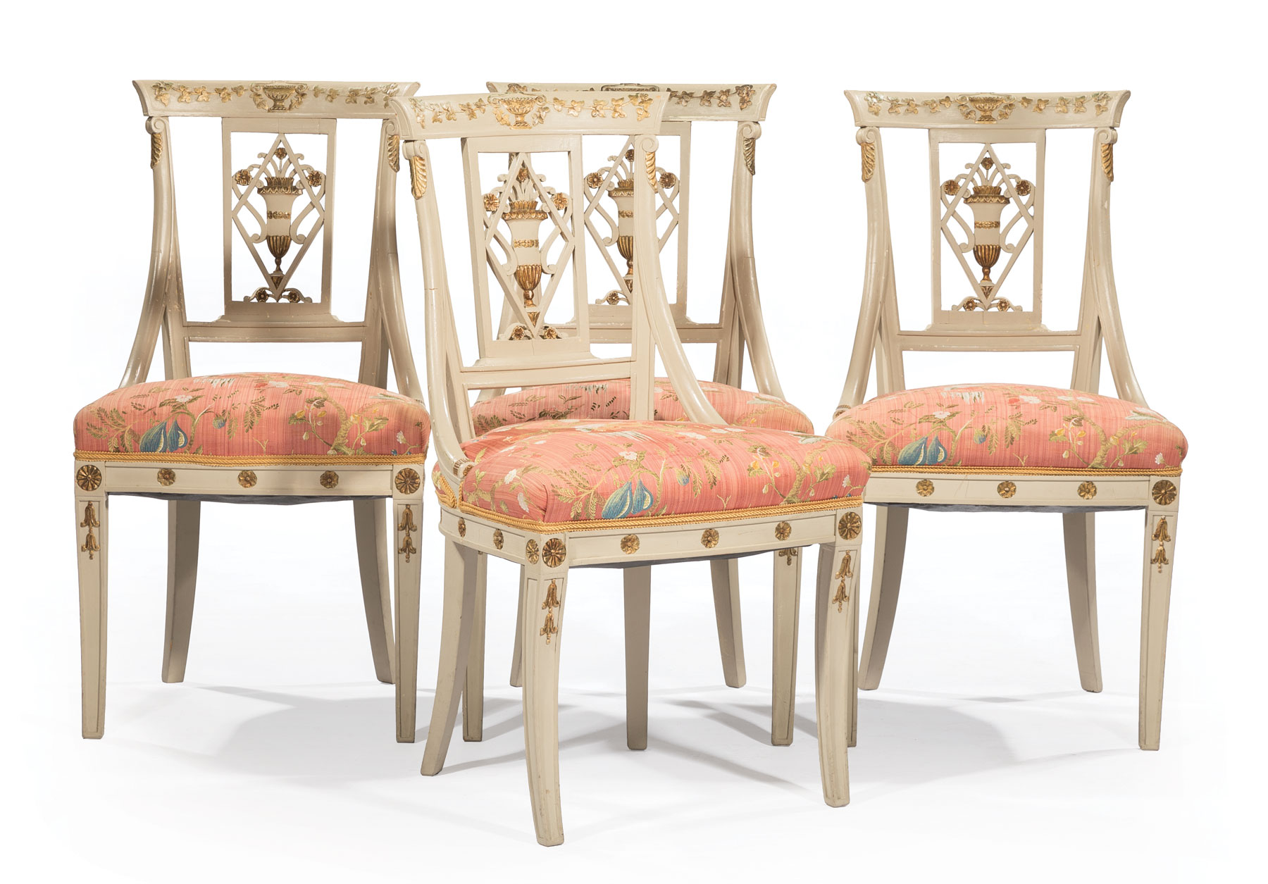 Four Directoire-Style Painted and Parcel Gilt Side Chairs , crest rail and pierced back with urn and