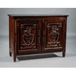 Neoclassical-Style Carved and Stained Pine Cabinet , fluted frieze, two panel doors decorated with