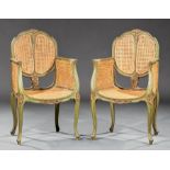 Pair of Vintage Continental Painted and Caned Bergeres , cartouche back, foliate decoration,