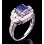 14 kt. White Gold, Tanzanite and Diamond Ring , prong set square cushion modified brilliant cut