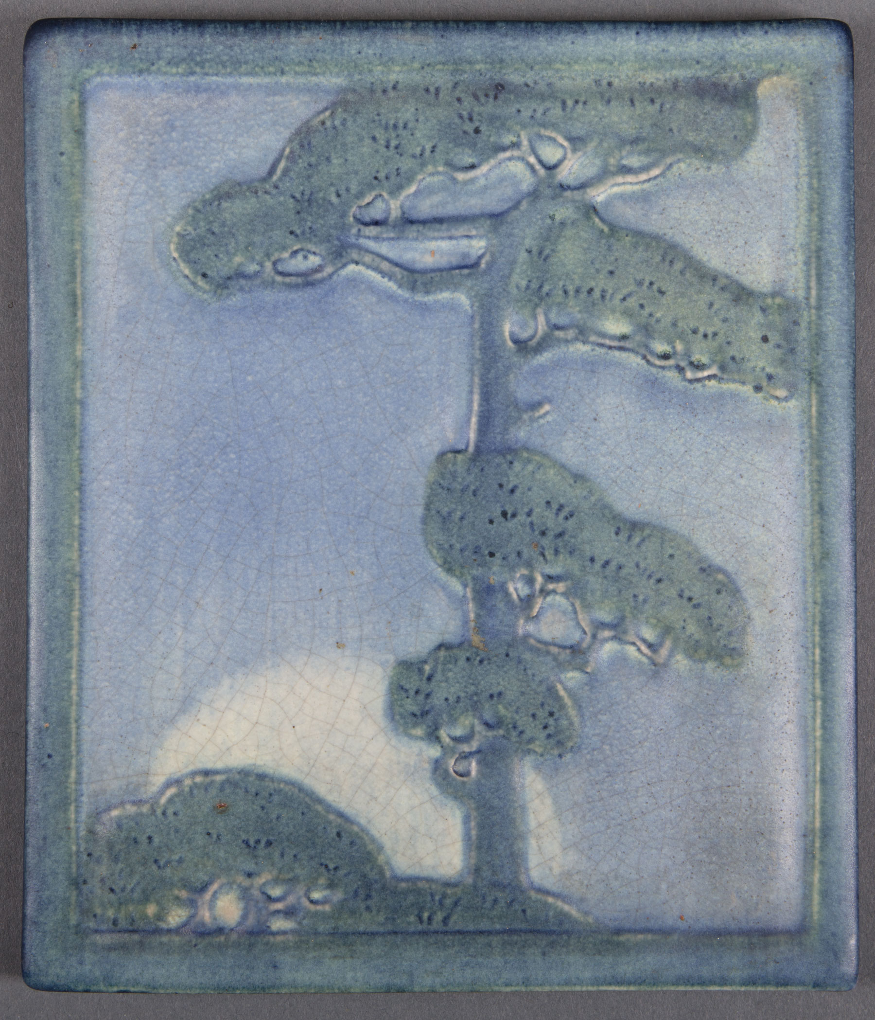 Newcomb College Art Pottery Tile , 1913 decorated with low relief-carved pine tree, matte glaze with - Image 2 of 3