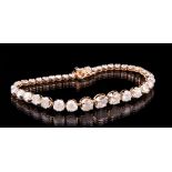 18 kt. Yellow Gold and Graduated Diamond Bracelet , 37 round brilliant cut diamonds, 2.5-5.6 mm,