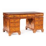 William IV-Style Burled and Figured Walnut Pedestal Desk , 20th c., inset green tooled leather