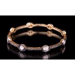 Yellow Gold, Silver and Diamond Bangle Bracelet , 8 diamond tablets, total wt. approx. 0.75 ct.;